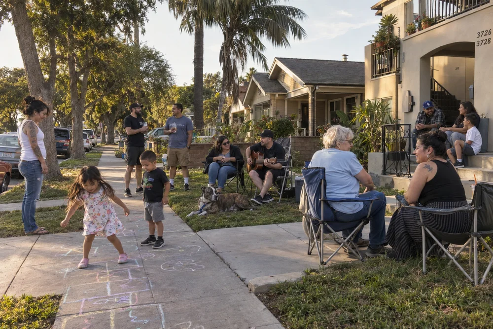 Imagined neighbors enjoying an informal residential block gathering.